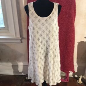 Cream colored shear fully lined dress.